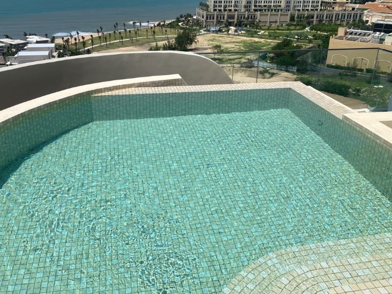 Hồ bơi condotel Resort Ixora Hồ Tràm by Fusion - thi cong boi Van Lang Pool - anh 01